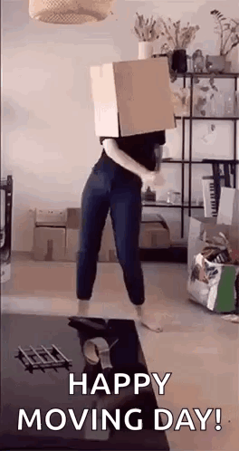 A Woman Is Wearing A Cardboard Box On Her Head . GIF