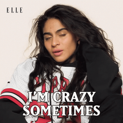 A Woman Is Wearing A Chicago Bulls Jersey And Says I 'M Crazy Sometimes GIF