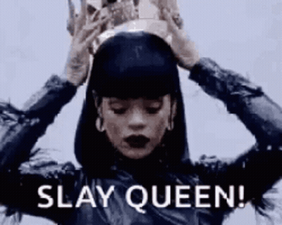 A Woman Is Wearing A Crown On Her Head And Saying Slay Queen . GIF