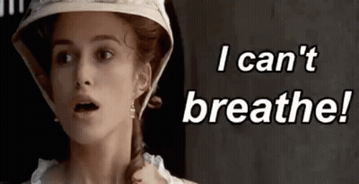 A Woman Is Wearing A Hat And Earrings And Says I Can 'T Breathe . GIF