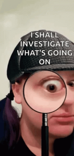 A Woman Is Wearing A Hat And Holding A Magnifying Glass In Front Of Her Eye . GIF