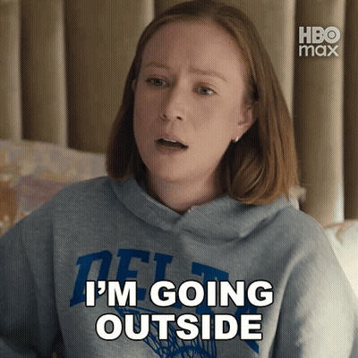 A Woman Is Wearing A Hoodie That Says I 'M Going Outside GIF