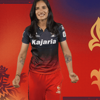 A Woman Is Wearing A Kajaria Jersey GIF