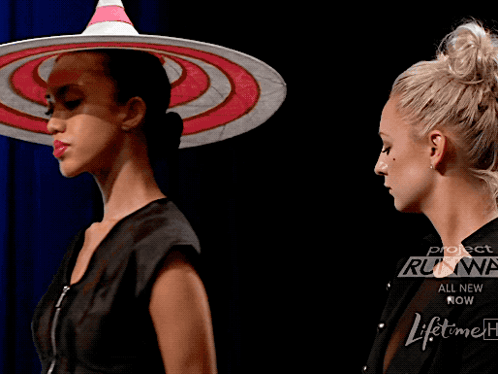 A Woman Is Wearing A Pair Of Underwear That Says Project Runway On It GIF
