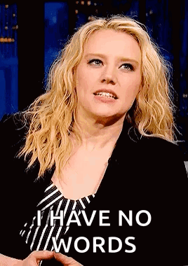 A Woman Is Wearing A Shirt That Says `` I Have No Words '' GIF