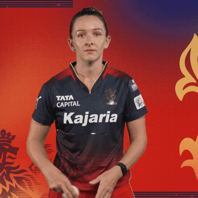 A Woman Is Wearing A Shirt That Says Kajaria On It GIF