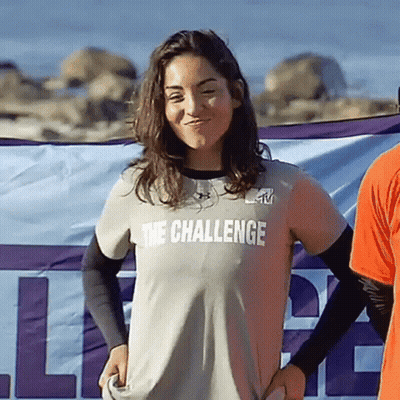 A Woman Is Wearing A Shirt That Says The Challenge On It GIF