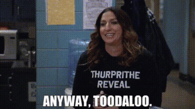 A Woman Is Wearing A T-Shirt That Says `` Thurprithe Reveal '' And Is Smiling . GIF