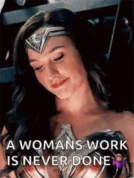 A Woman Is Wearing A Wonder Woman Costume And Says `` A Woman 'S Work Is Never Done '' . GIF