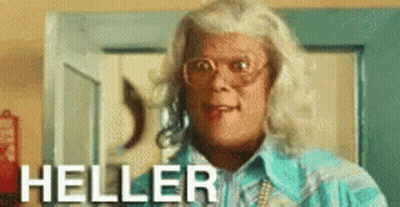 A Woman Is Wearing Glasses And A Blue Shirt And The Word Heller Is On The Bottom GIF