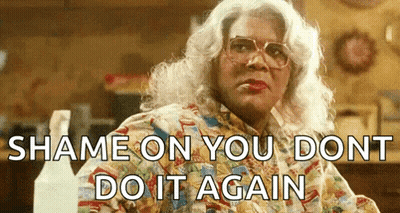 A Woman Is Wearing Glasses And A Colorful Shirt And Says `` Shame On You Dont Do It Again '' GIF