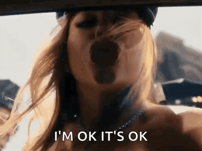 A Woman Is Yawning In A Car And Saying I 'M Ok It 'S Ok GIF