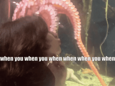 A Woman Kissing An Octopus With The Words " When You When You When When You When " Below Her GIF