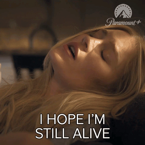 A Woman Laying Down With Her Eyes Closed And The Words I Hope I 'M Still Alive In Front Of Her GIF