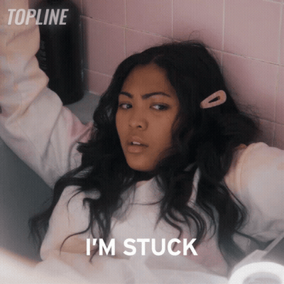 A Woman Laying In A Bathtub With The Words " I 'M Stuck " Above Her GIF