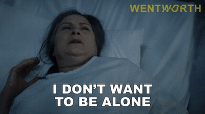 A Woman Laying In A Hospital Bed With The Words " I Don 'T Want To Be Alone " GIF