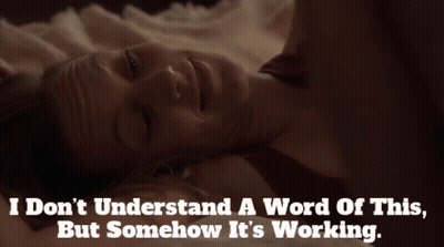 A Woman Laying On A Bed With The Words I Don T Understand A Word Of This But Somehow It 'S Working Below Her GIF