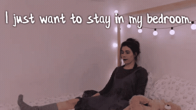 A Woman Laying On A Bed With The Words I Just Want To Stay In My Bedroom GIF