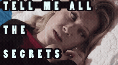 A Woman Laying On A Bed With The Words Tell Me All The Secrets Written Above Her GIF