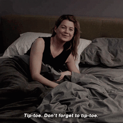 A Woman Laying On A Bed With The Words Tip-Toe Don 'T Forget To Tip-Toe Below Her GIF