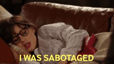 A Woman Laying On A Couch With The Words " I Was Sabotaged " On The Bottom GIF