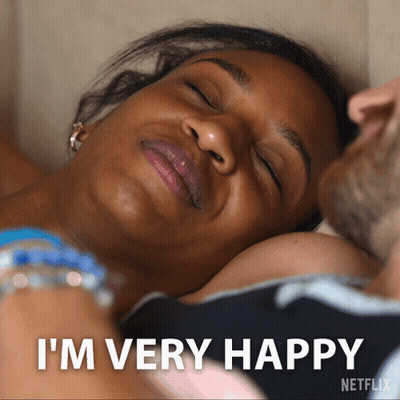 A Woman Laying On A Man 'S Chest With The Words I 'M Very Happy Below Her GIF