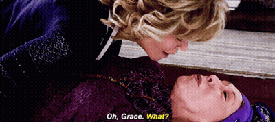 A Woman Laying On The Floor Talking To Another Woman With The Words Oh Grace What GIF