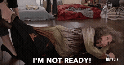 A Woman Laying On The Floor With The Words I 'M Not Ready On The Bottom GIF
