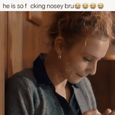 A Woman Leaning Against A Wall With The Words He Is So F Cking Nosey Bru GIF