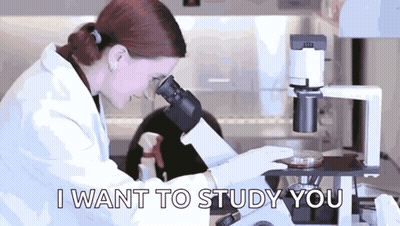 A Woman Looking Through A Microscope With The Words " I Want To Study You " Written Below Her GIF