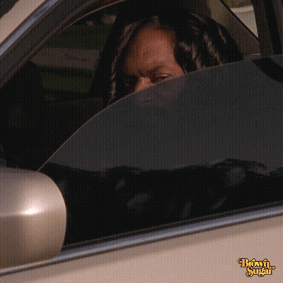 A Woman Looks Out Of A Car Window With The Words Brown Sugar On The Side GIF