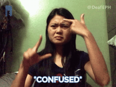 A Woman Making A Confused Sign With Her Hands On Her Forehead GIF