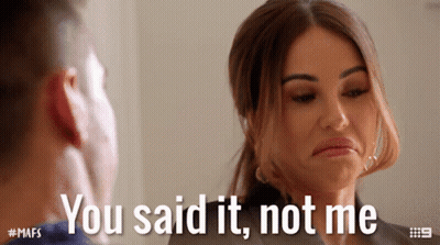 A Woman Making A Face With The Words You Said It Not Me Behind Her GIF