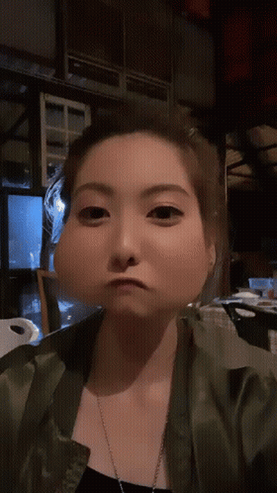 A Woman Making A Funny Face With A Big Nose GIF