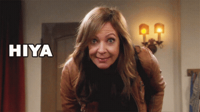 A Woman Making A Funny Face With The Word Hiya Above Her Head GIF