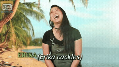 A Woman Named Erika Is Laughing On A Beach With Palm Trees GIF