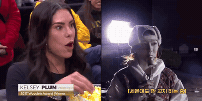 A Woman Named Kelsey Plum Is Eating Popcorn GIF