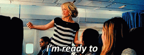A Woman On An Airplane Says I 'M Ready To While Dancing GIF