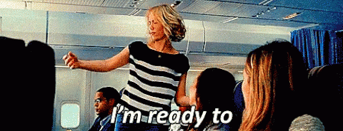 A Woman On An Airplane Says I 'M Ready To While Dancing GIF