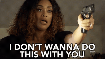 A Woman Pointing A Gun With The Words I Don T Wanna Do This With You Behind Her GIF