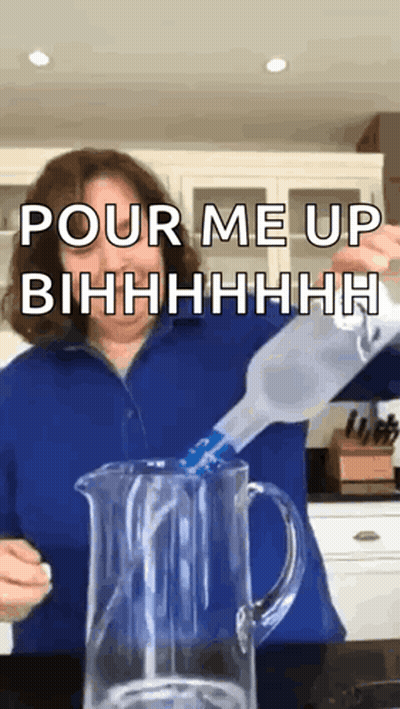 A Woman Pouring Water Into A Pitcher With The Words Pour Me Up Bihhhh Written Above Her GIF