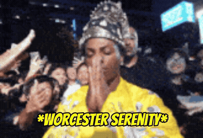 A Woman Praying In Front Of A Crowd With The Words Worcester Serenity On The Bottom GIF