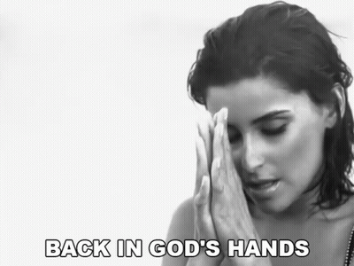 A Woman Praying With The Words Back In God 'S Hands Written Below Her GIF