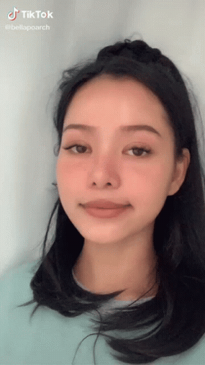 A Woman 'S Face Is Shown With A Tiktok Watermark GIF