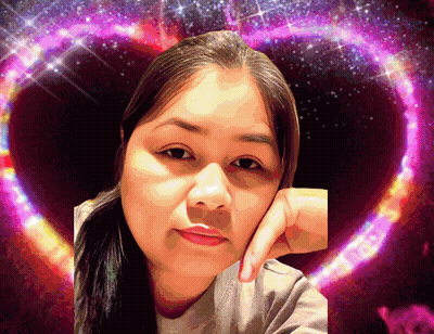 A Woman 'S Face Is Surrounded By A Purple Heart GIF