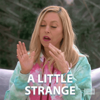A Woman Says " A Little Strange " With Her Hands In Front Of Her Face GIF