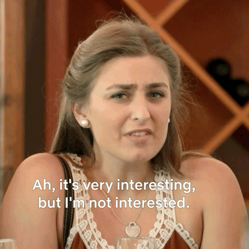 A Woman Says " Ah , It 'S Very Interesting , But I 'M Not Interested " GIF