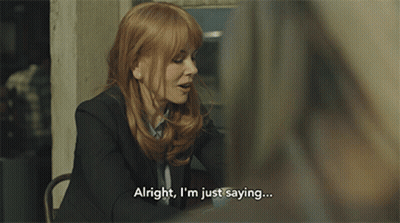 A Woman Says Alright I 'M Just Saying While Sitting At A Table GIF