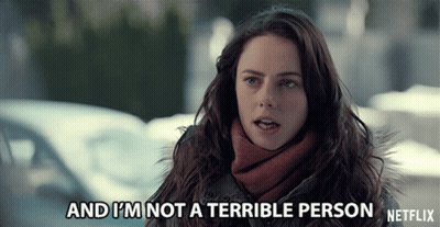 A Woman Says " And I 'M Not A Terrible Person " In Front Of A Netflix Logo GIF