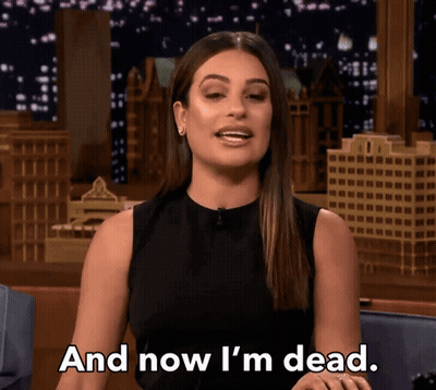 A Woman Says " And Now I 'M Dead " In Front Of A Cityscape GIF